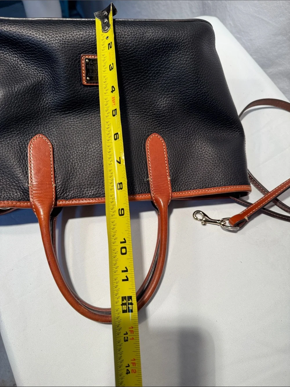 Dooney & Bourke Black Pebbled Leather Tote with Brown Trim & Handles